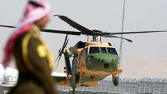 A helicopter carrying Jordan's King Abdullah II arrives at Queen Alia International Airport in Amman on March 28, 2017, ahead of an Arab League summit