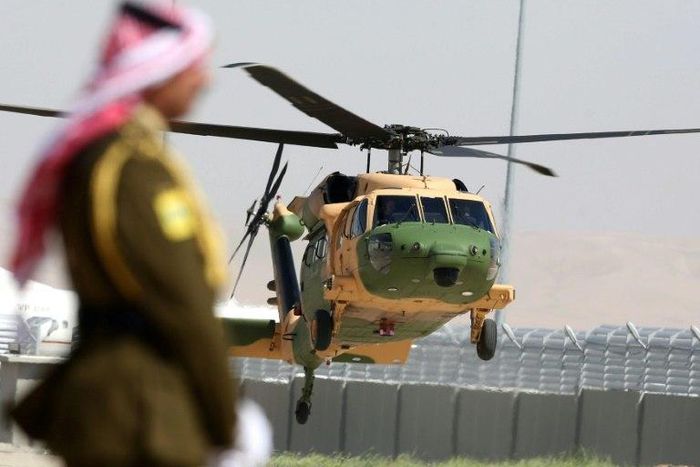 A helicopter carrying Jordan's King Abdullah II arrives at Queen Alia International Airport in Amman on March 28, 2017, ahead of an Arab League summit