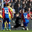 Burnley's Ashley Barnes (L) shoots to score the opening goal past Crystal Palace's Wayne Hennessey during their match at Selhurst Park in south London on April 29, 2017