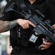 Armed police secure a street in central Manchester, on May 24, 2017