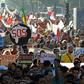 Demonstrators shout slogans and hold placards during a demonstration against climate change and calling for environmental action to protect the planet during a protest in Marrakesh on the sidelines of the COP22 climate conference on November 13, 2016