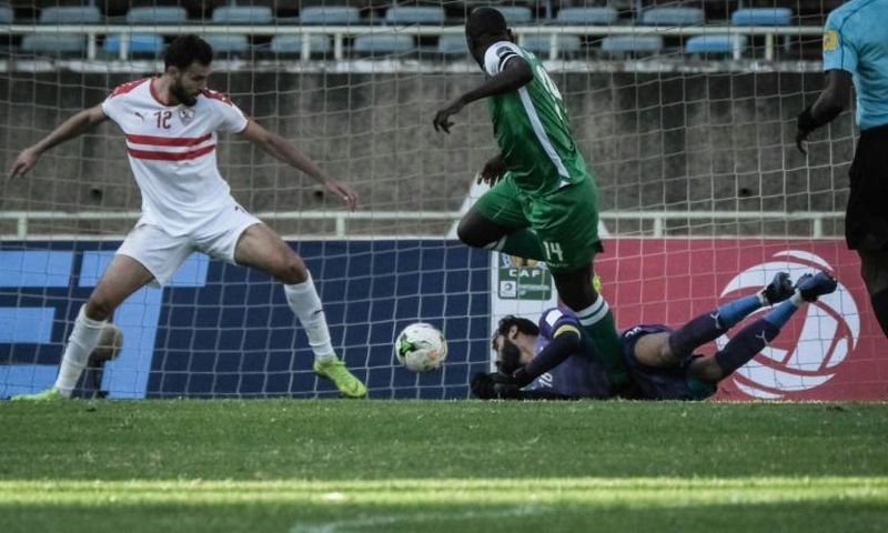 Dennis Oliech scores the goal that sealed a 4-2 CAF Confederation Cup group victory for Gor Mahia of Kenya over Zamalek of Egypt