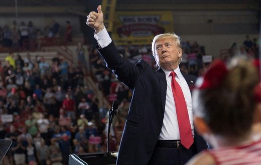 At an enthusiastic, campaign-style rally in Pennsylvania, US President Donald Trump (C) said the record of his first 100 days has been "very exciting and very productive"