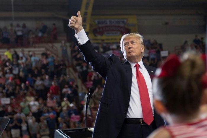 At an enthusiastic, campaign-style rally in Pennsylvania, US President Donald Trump (C) said the record of his first 100 days has been "very exciting and very productive"