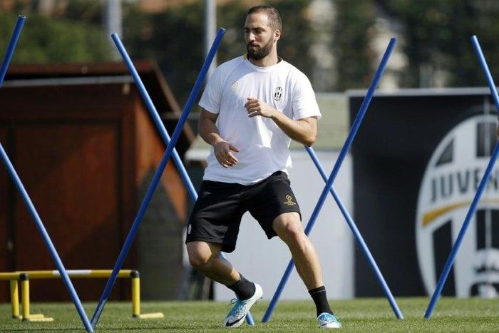 Juventus' forward Gonzalo Higuain from Argentina takes part in a training session at the Juventus Training Center in Vinovo, near Turin, on April 10, 2017