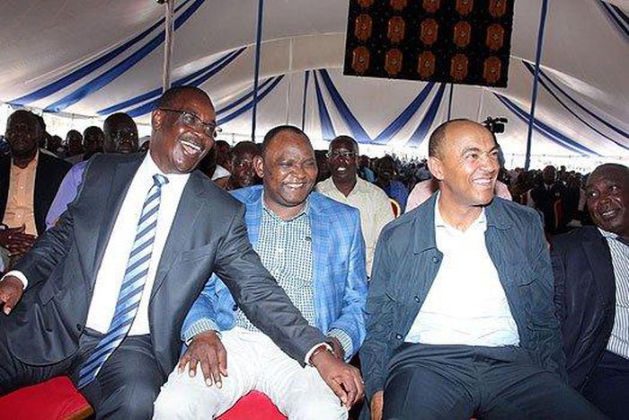 Nairobi Governor Evans Kidero (left), Kasarani MP John Njoroge (centre) and Nairobi gubernatorial aspirant Peter Kenneth (right) during a church service in Ruai on January 29, 2017.
