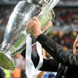 Carlo Ancelotti celebrates with the Champions League trophy after guiding Real Madrid to a 4-1 victory over Atletico Madrid in 2014