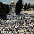 Tens of thousands of Palestinians attend the first Friday prayers of the Muslim holy month of Ramadan outside the Dome of the Rock at Jerusalem's al-Aqsa mosque compound on June 2, 2017