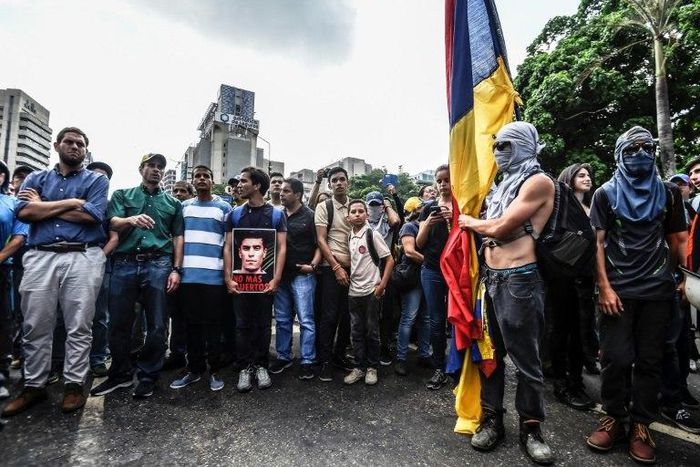 Venezuela opposition leader Henrique Capriles joins a march paying tribute to student Juan Pablo Pernalete killed during a protest against President Nicolas Maduro