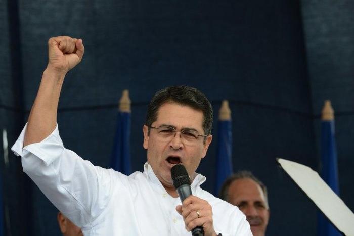 President Juan Orlando Hernandez said he would run on his record of fighting the violent crime that made Honduras one of the most murderous countries in the world