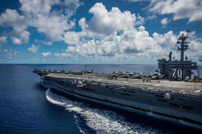 USS Carl Vinson, seen here in a US Navy handout in the Phillipine Sea, is heading toward North Korea after initial confusion over its route