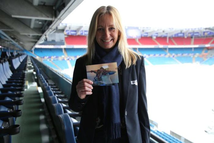 Hege Jorgensen, former sports manager in Kolbotn IL where she briefly trained Ada Hegerberg and current chief executive of the Women's Football Association in Norway, holds a photograph of Ada Hegerberg as a young player