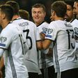 Germany midfielder Toni Kroos (L) is congratulated by teammates after making it 2-0 during the 2018 World Cup qualifier against the Czech Republic in Hamburg, northern Germany, on October 8, 2016