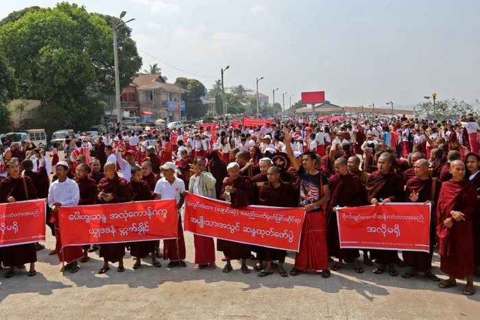 Monks and ethnic Mon march during a rally in Mawlamyine in Myanmar's Mon State on March 19, 2017, to protest against plans to name a bridge after Aung San Suu Kyi's father