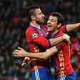 CSKA Moscow's Alan Dzagoev (R) celebrates with teammate Zoran Tosic after scoring a goal during an UEFA Champions League match, in December 2016
