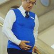 Japanese politician Shunji Kono wears a pregnancy vest in a video filmed by the Kyushu-Yamaguchi Work Life Balance Promotion Campaign