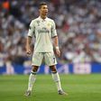 Real Madrid's Portuguese forward Cristiano Ronaldo prepares for a free kick during the UEFA Champions League quarterfinal match against Bayern Munich at the Santiago Bernabeu stadium in Madrid, Spain, on April 18, 2017