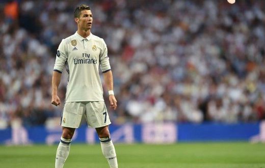 Real Madrid's Portuguese forward Cristiano Ronaldo prepares for a free kick during the UEFA Champions League quarterfinal match against Bayern Munich at the Santiago Bernabeu stadium in Madrid, Spain, on April 18, 2017