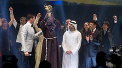 Peter Tabichi celebrates after winning the $1 million 2019 Varkey Foundation Global Teacher Prize