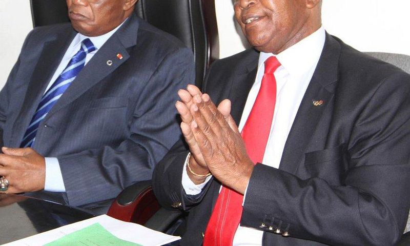 Africa National Olympic Committee of Africa president Lassana Palenfo (L) meets National Olympic Committee-Kenya president Dr Kipchoge Keino