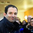 French former minister and candidate for the left-wing primaries, Benoit Hamon, poses at a polling station on January 22, 2017 in Trappes, southwest of Paris