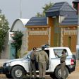 Saudi security personnel surround a rest house at the al-Munissiyah district, north-east of Riyadh, during a search for Al-Qaeda terror suspects on January 16, 2006