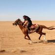 Syrians take part in a horse race for thoroughbred Arabian horses sponsored by Turkish NGO IHH, on May 12, 2017, in the southern Aleppo countryside