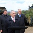 US Defense Secretary James Mattis flanked by his Lithuanian and Latvian counterparts after meeting troops in Lithuania
