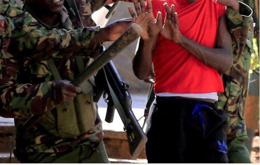 File image of police arresting a university student during a past protest