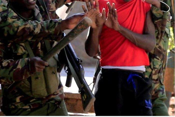File image of police arresting a university student during a past protest