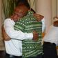 Elson Pesireron (L) hugs his brother Sammy as he and other freed Indonesian sailors held hostage for nearly five years by Somali pirates reunite with family members at the Foreign Ministry office in Jakarta on October 31, 2016