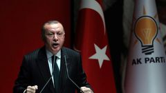 President of Turkey and ruling Justice and Development (AK) Party chairman Recep Tayyip Erdogan makes a speech during a meeting at party headquarters, in Ankara on December 6, 2018