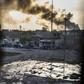 Smoke billows from Islamic State positions as a convoy from the Iraqi Special Forces 2nd division move into position during fighting in the eastern Samah area of Mosul