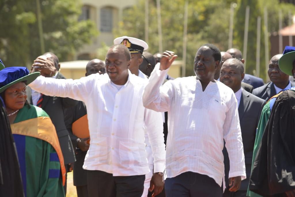 President Uhuru Kenyatta with former Prime Minister Raila Odinga (PSCU)