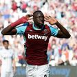 West Ham United's Cheikhou Kouyate celebrates scoring the opening goal against Swansea City at The London Stadium, in east London on April 8, 2017
