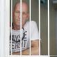 David Fox, a British former war correspondent, waits in a holding cell in Denpasar on Indonesia's resort island of Bali on March 9, 2017 before his trial for using hashish