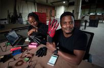 Roy Allela tries out his smart gloves