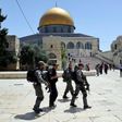Israeli police walk past the Dome of the Rock in the compound known to Muslims as the Haram al-Sharif and to Jews as Temple Mount on May 16, 2017
