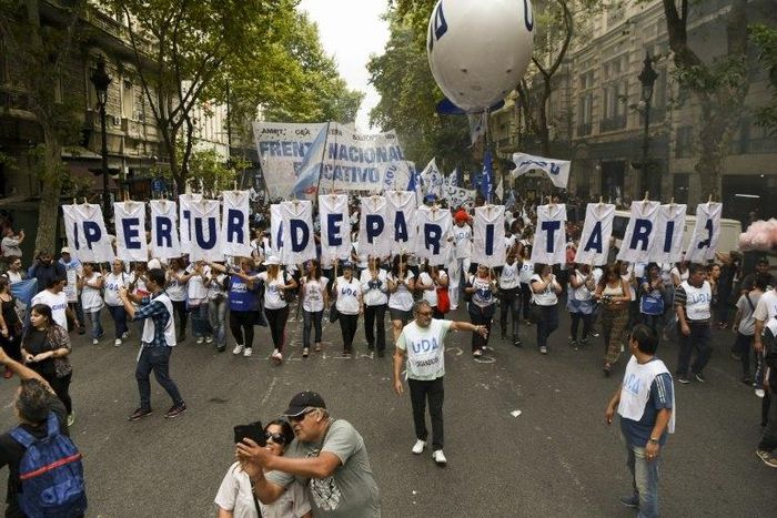 Teachers march during a 48-hour nationwide strike demanding pay rises, in Buenos Aires on March 22, 2017