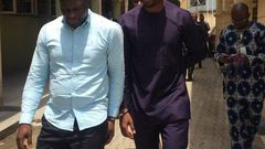 Lekki Gardens MD, Richard Nyong (right) and contractor arrive an Ebute-Meta Magistrate Court in handcuffs on Friday, March 11.