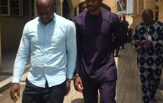 Lekki Gardens MD, Richard Nyong (right) and contractor arrive an Ebute-Meta Magistrate Court in handcuffs on Friday, March 11.