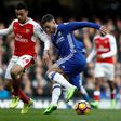 Chelsea's Eden Hazard (right) cuts past Arsenal's Francis Coquelin during their English Premier League match at Stamford Bridge in London, on February 4, 2017