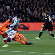 Chelsea's midfielder Eden Hazard (R) shoots past West Ham United's goalkeeper Darren Randolph to score on March 6, 2017