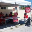 About 180,000 people are registered to cast votes in the Bahamas' election. Supporters of the Free National Movement (FNM) are shown here gathered at a polling station in Nassau