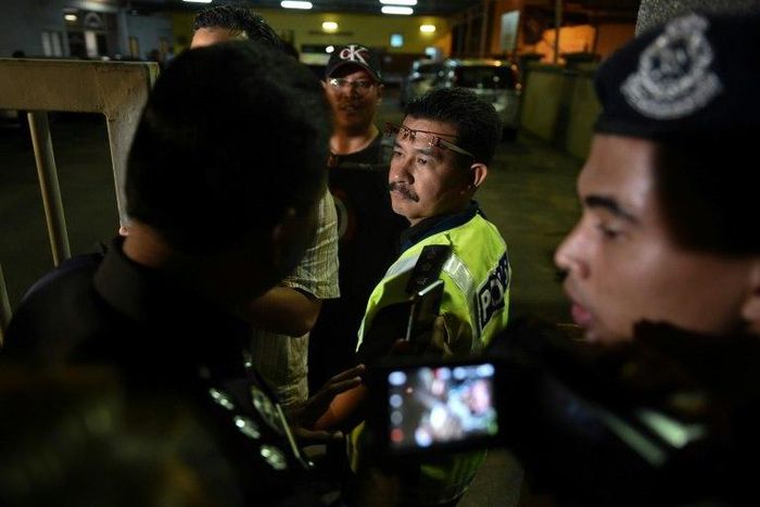 Malaysian police are detaining a woman holding a Vietnamese passport and seeking further suspects in the killing of Kim Jong-Nam, the half-brother of North Korea's leader