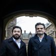 Leader of DENK ("think" in Dutch), the country's first party led by immigrants, Tunahan Kuzu (R) and Selcuk Ozturk pose at the Binnenhof in The Hague