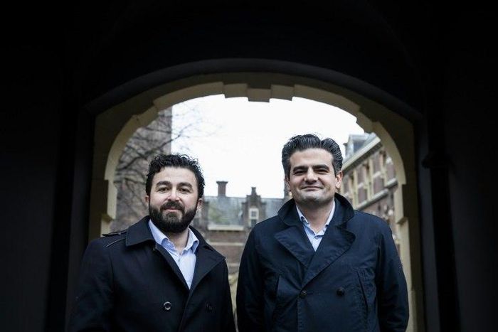 Leader of DENK ("think" in Dutch), the country's first party led by immigrants, Tunahan Kuzu (R) and Selcuk Ozturk pose at the Binnenhof in The Hague