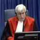 International Criminal Tribunal judge Alphons Orie is seeking Interpol's help to arrest three Serbs accused of witness-tampering in a case against Serb ultranationalist Vojislav Seselj