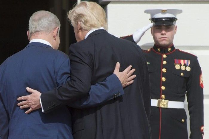US President Donald Trump and Israeli Prime Minister Benjamin Netanyahu walk into the White House on February 15 2017