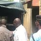 File image of police carrying a body into a police van. David Yano killed by family after spraying six children with bullets in Elgeyo Marakwet